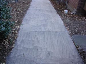 Damaged Sidewalk By Unlicensed Pressure Washer